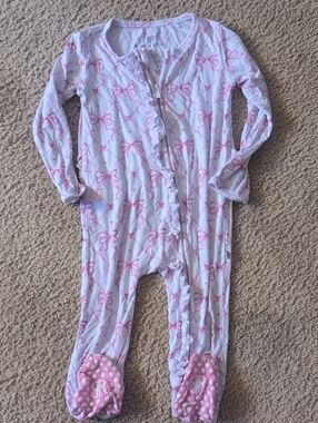 Pink Bow Print Footed One-Piece Pajamas with Front Ruffle Closure